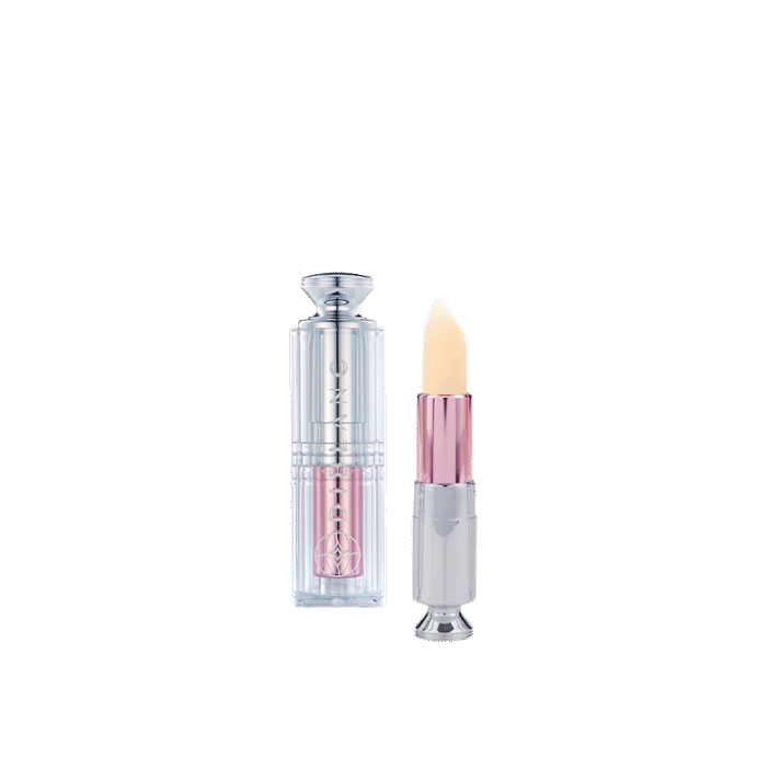 DIBLANC Sweetheart Tintstick color-changing lip balm on lips, showing a natural rosy tint.